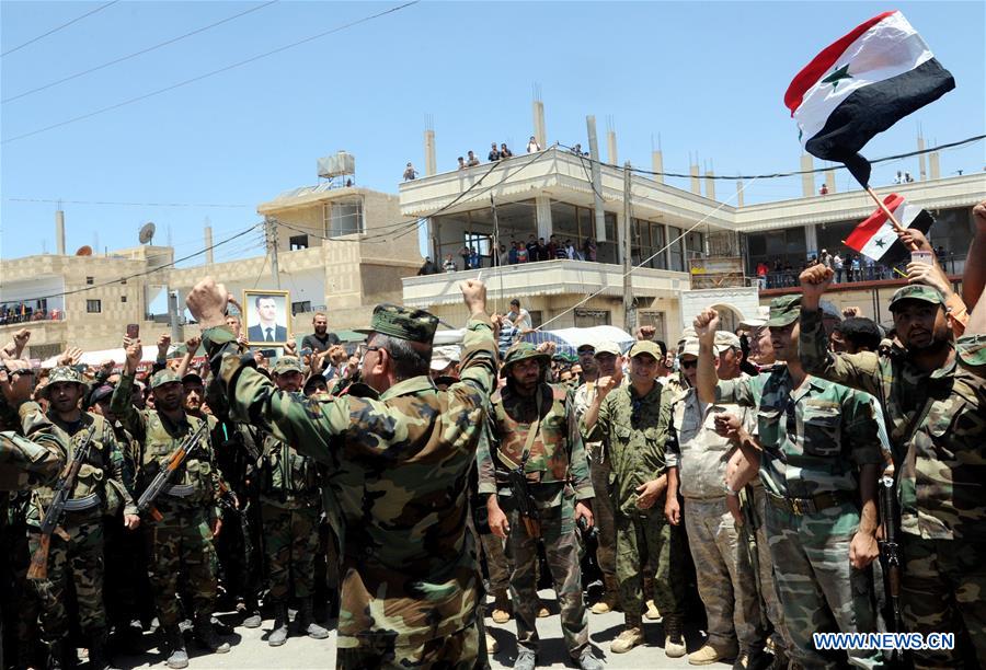 SYRIA-DARAA-ARMY-CELEBRATION