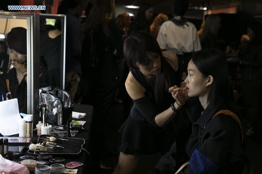 BRITAIN-LONDON-FASHION WEEK-ROLAND MOURET-BACKSTAGE