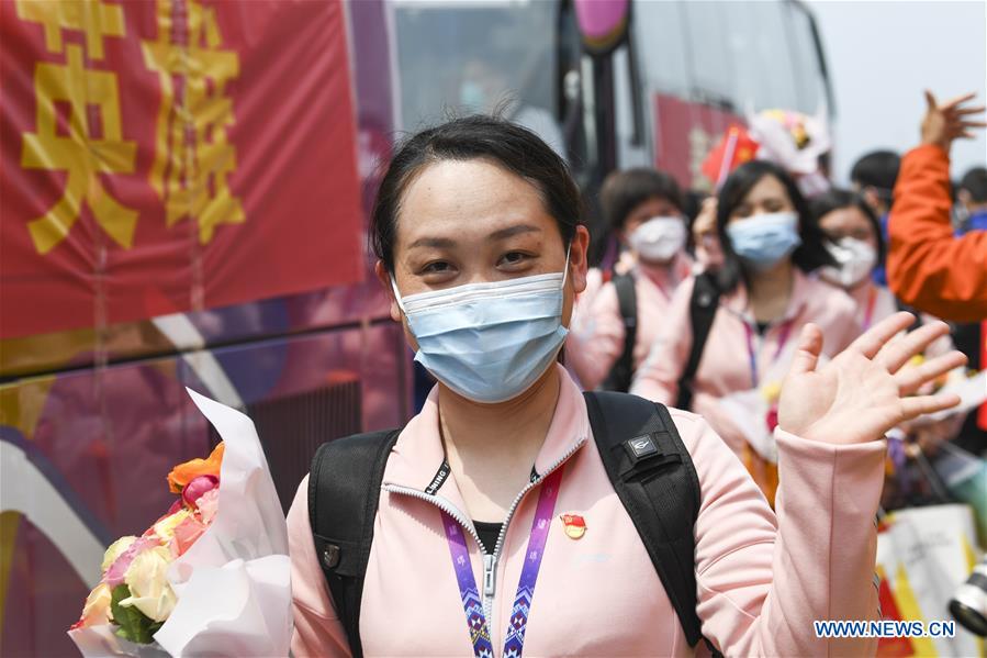 (PORTRAITS)CHINA-GUANGXI-COVID-19-MEDICS-RETURN HOME-ARRIVAL (CN)