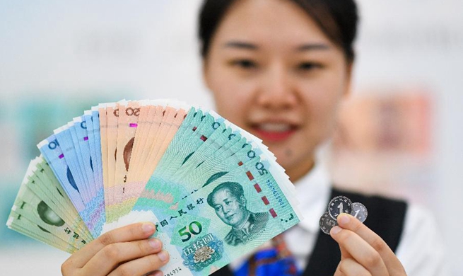 China issues new edition of renminbi bills, coins