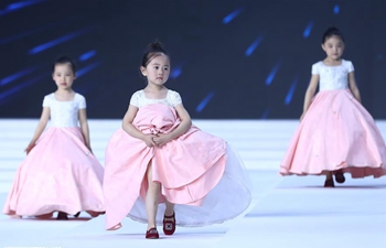 Creations designed by Xu Xinyin presented at China Fashion Week in Beijing